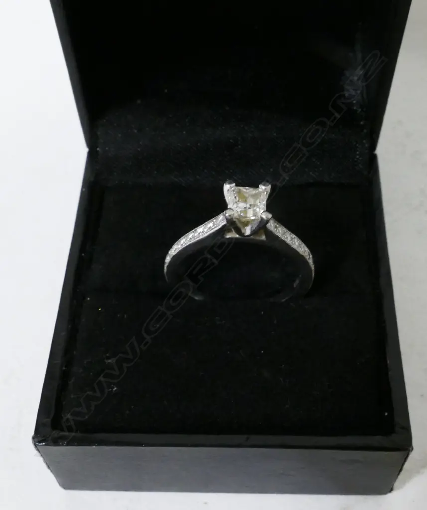 An 18ct. white gold and diamond solitaire ring Image 1++