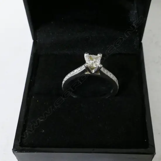 An 18ct. white gold and diamond solitaire ring