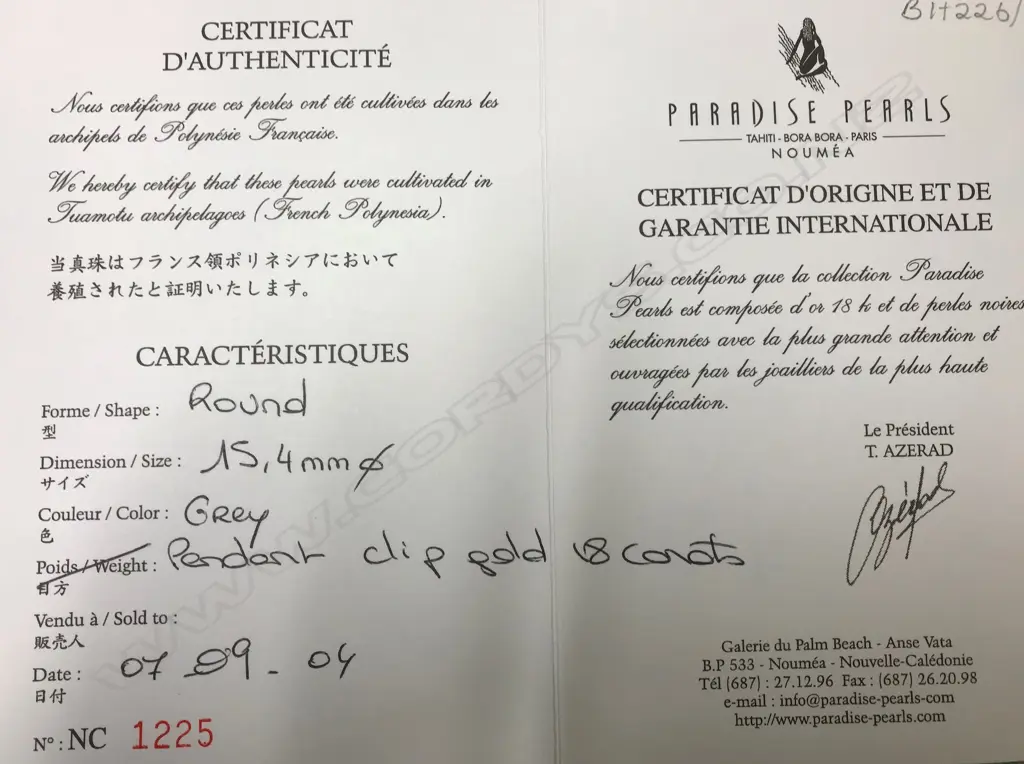 A 14ct gold Tahitian black pearl and diamond suite Image 1++