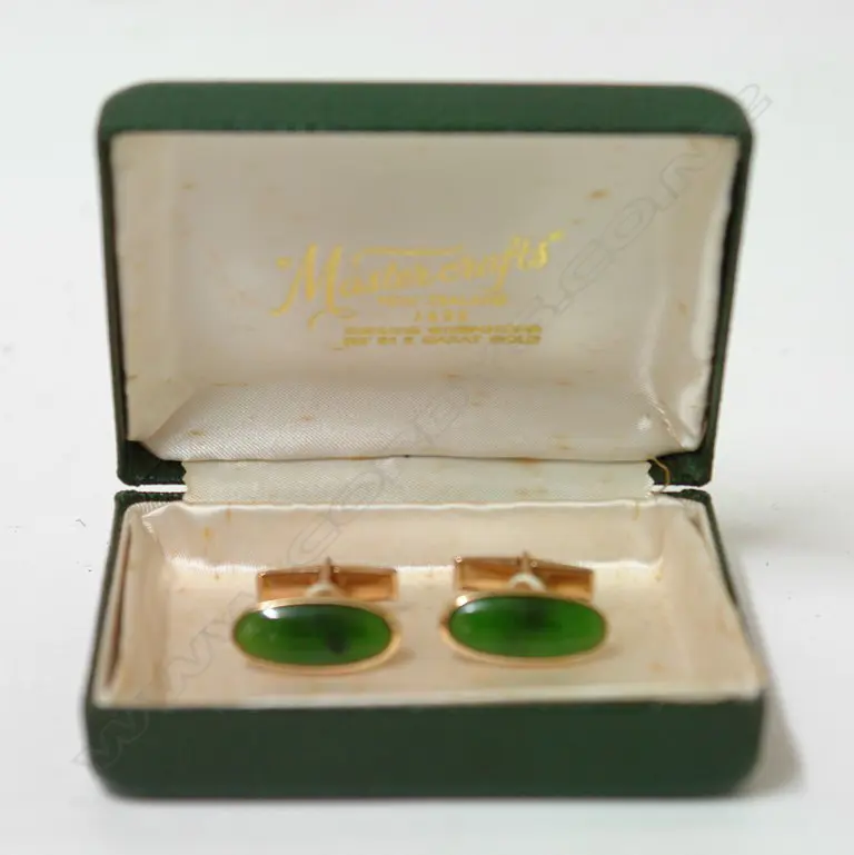 A pair of 1960s 'Master Crafts' 9ct. rose gold and greenstone cufflinks Image 1++