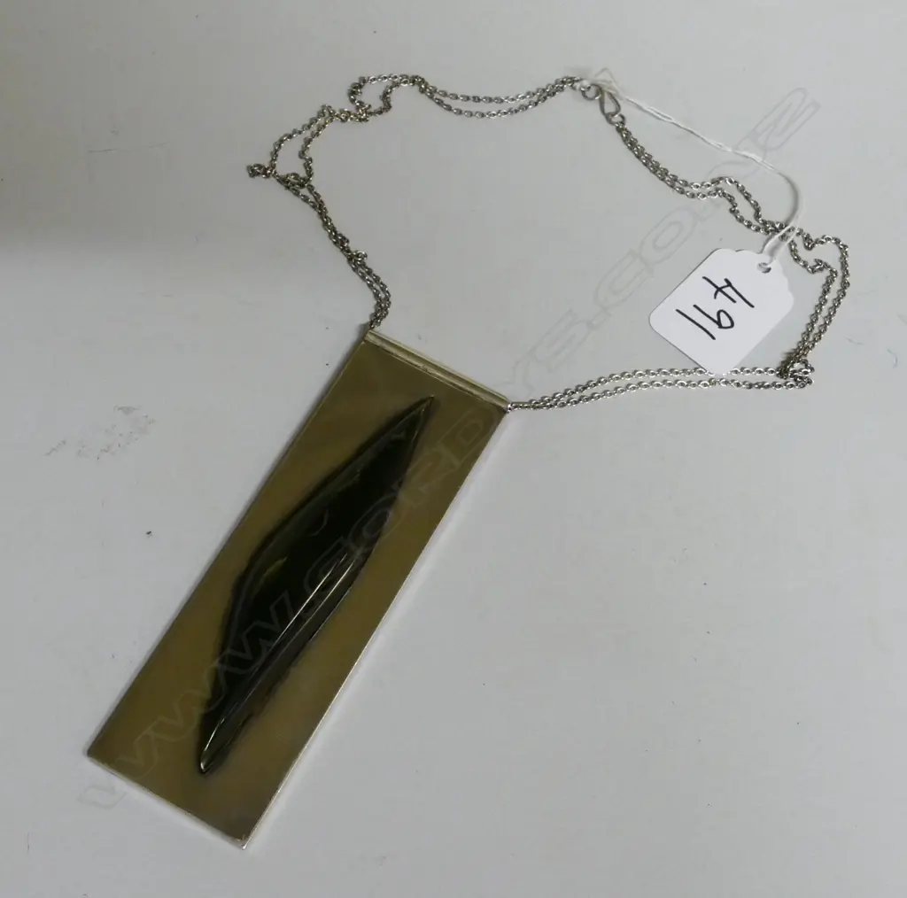 A contemporary silver and 'Marsden flower' pounamu pendant Image 1++