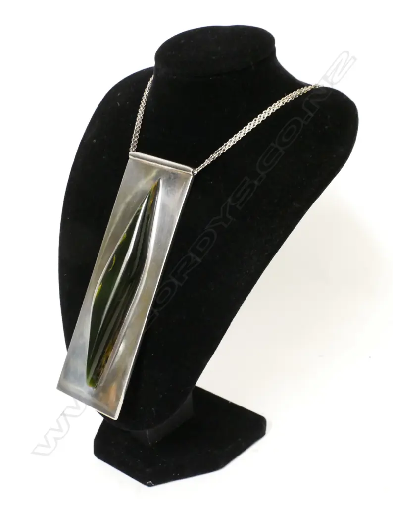 A contemporary silver and 'Marsden flower' pounamu pendant Image 1++