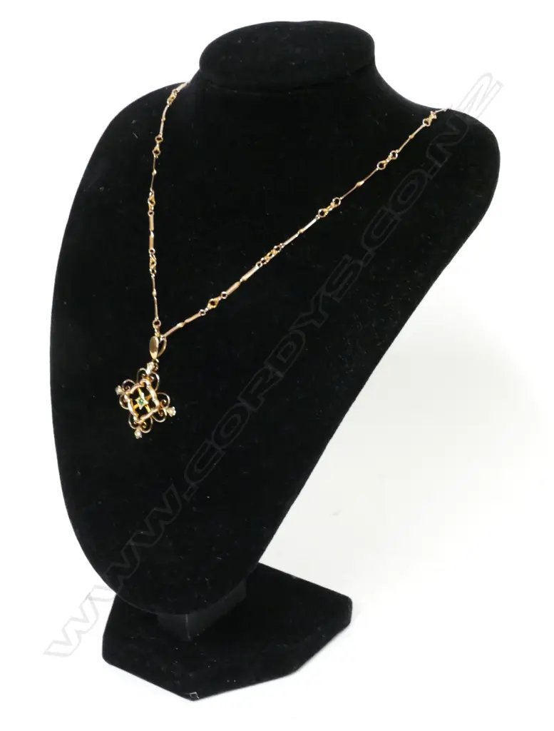 A 9ct. greenstone and seed pearl pendant Image 1++