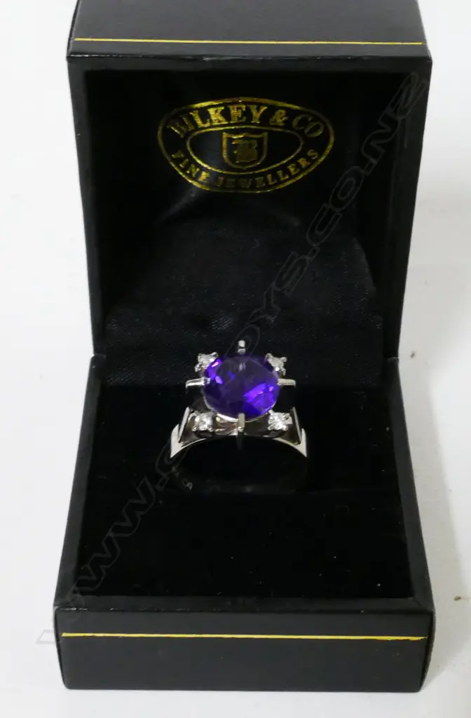 A vintage 18ct. white gold amethyst and diamond lady's dress ring Image 1++