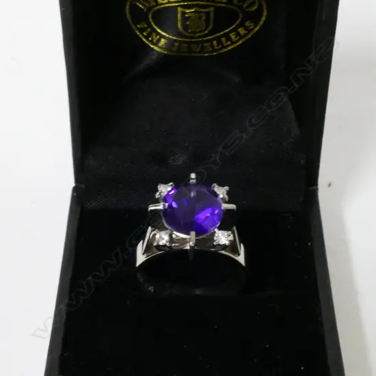 A vintage 18ct. white gold amethyst and diamond lady's dress ring