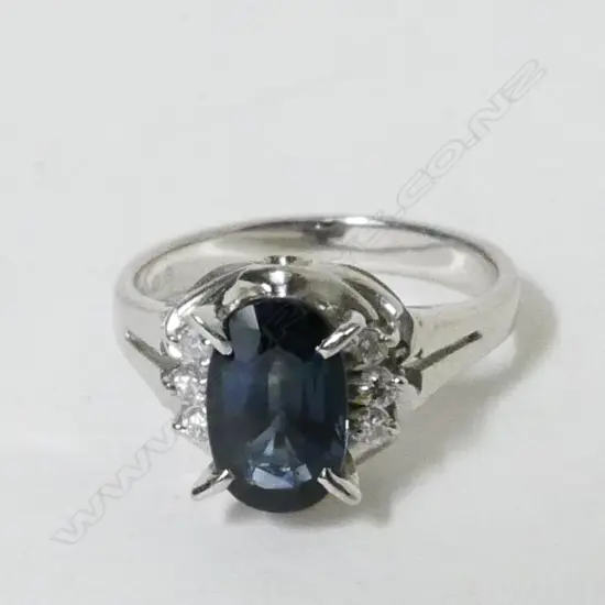 A platinum sapphire and diamond dress ring