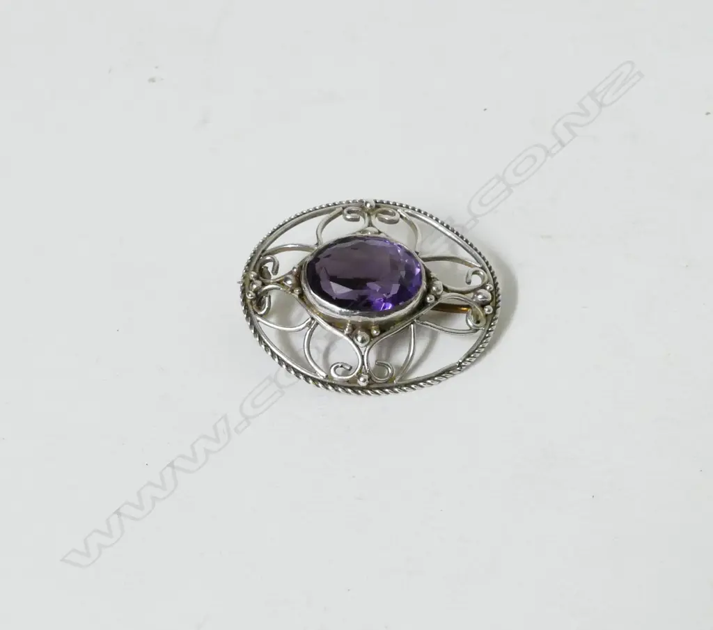 A silver and amethyst Arts & Crafts brooch Image 1++