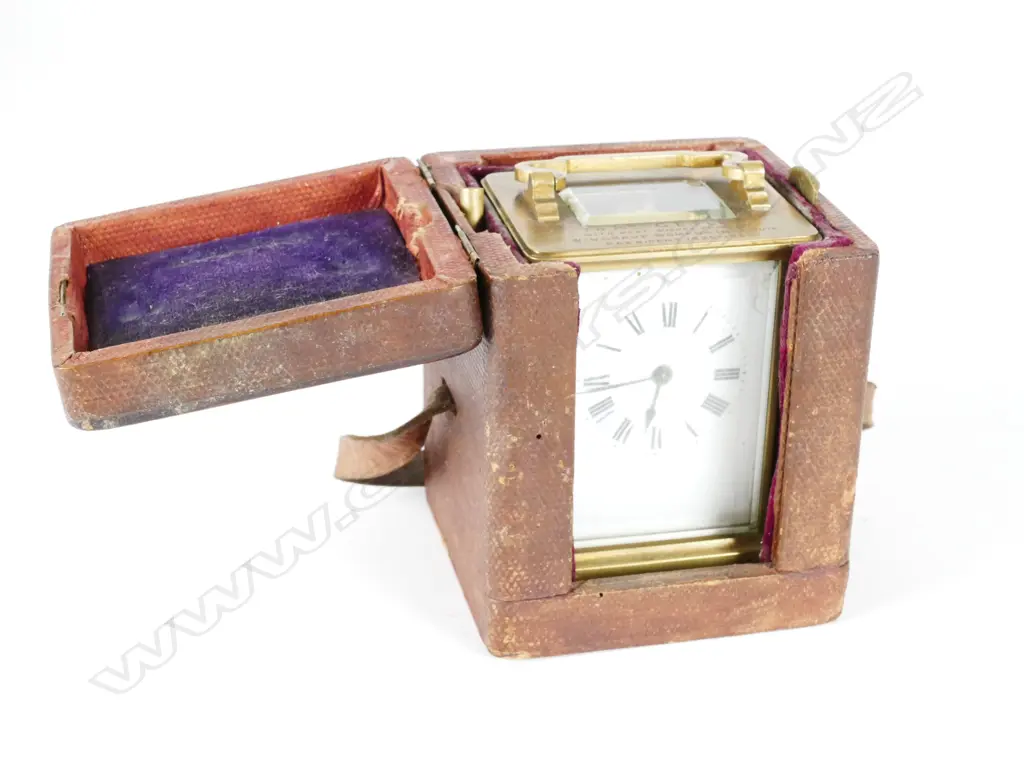 A brass cased carriage clock Image 1++