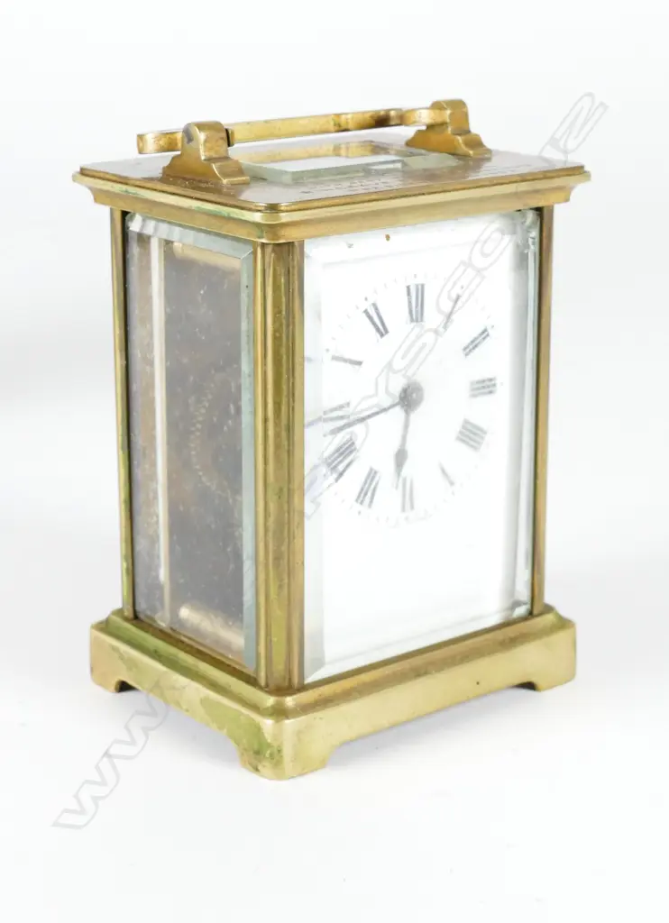 A brass cased carriage clock Image 1++