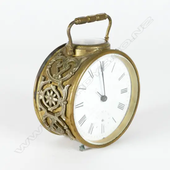 An Edwardian brass drum cased mantel clock