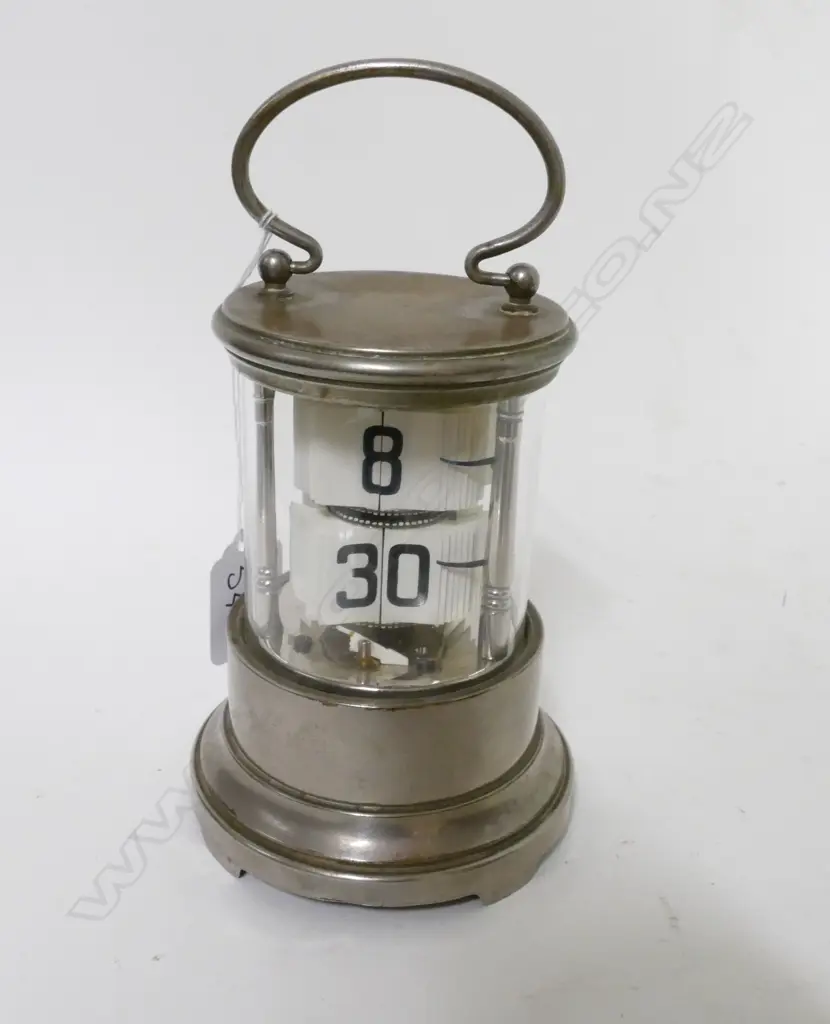 A rare silver plated ticket clock Image 1++