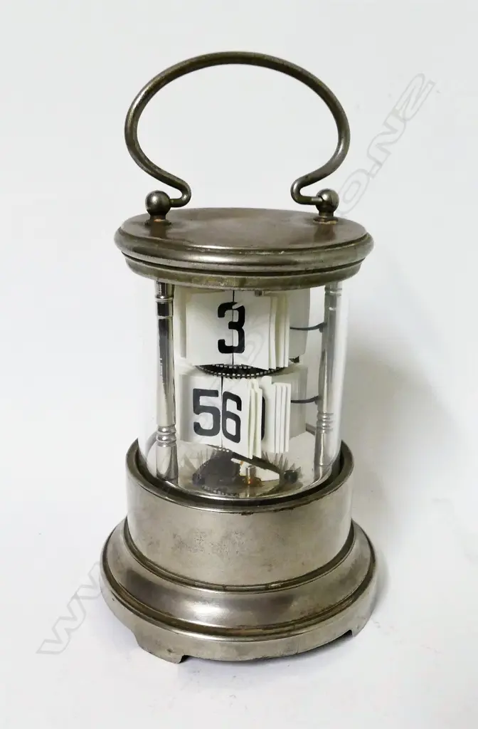 A rare silver plated ticket clock Image 1++