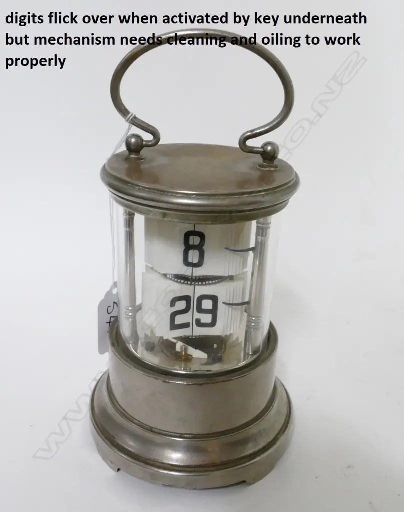 A rare silver plated ticket clock Image 1++