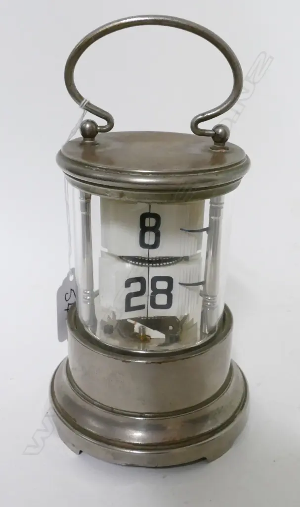 A rare silver plated ticket clock Image 1++