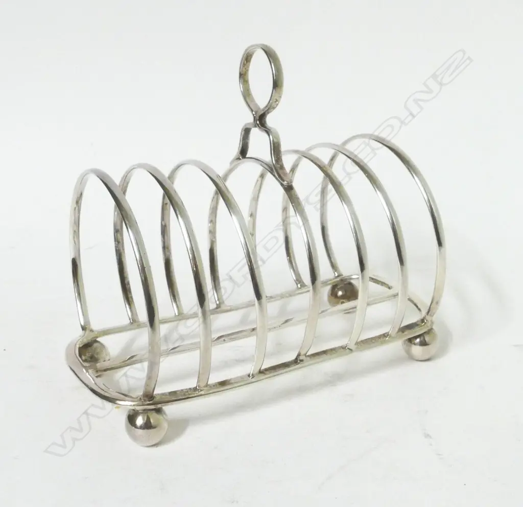 A Victorian silver seven bar toast rack Image 1++