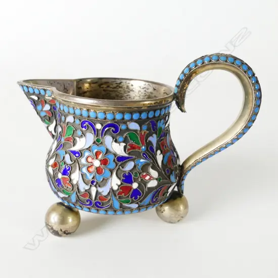 A Russian silver and cloisonné cream jug
