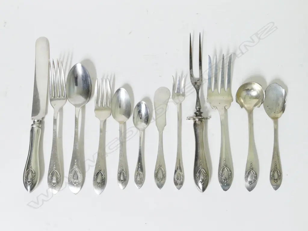 An American silver cutlery set Image 1++