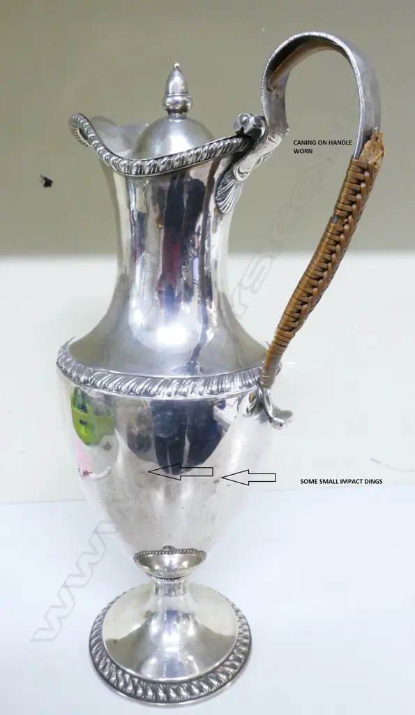 A George III silver claret jug Image 1++