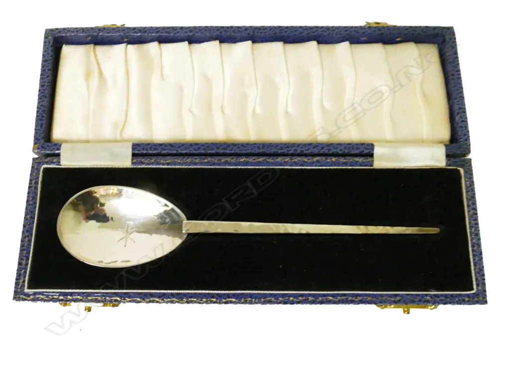A silver anointing spoon Image 1++