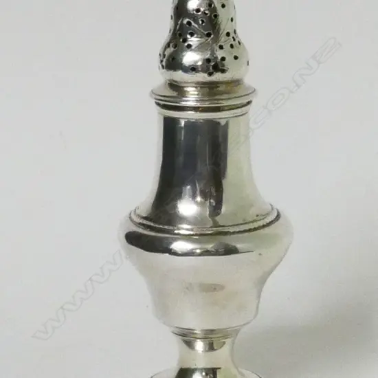 A heavy George III silver sugar caster