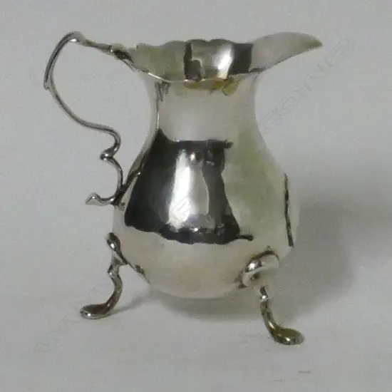 A George III silver pear shaped creamer