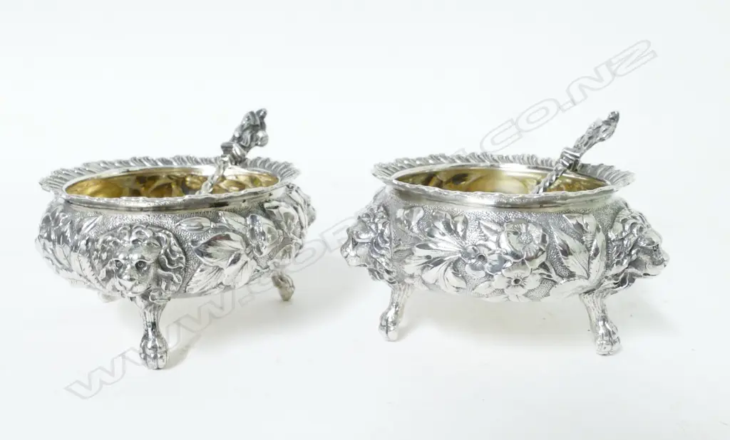A pair of American silver cauldron salt cellars and a pair of Victorian silver salt spoons Image 1++