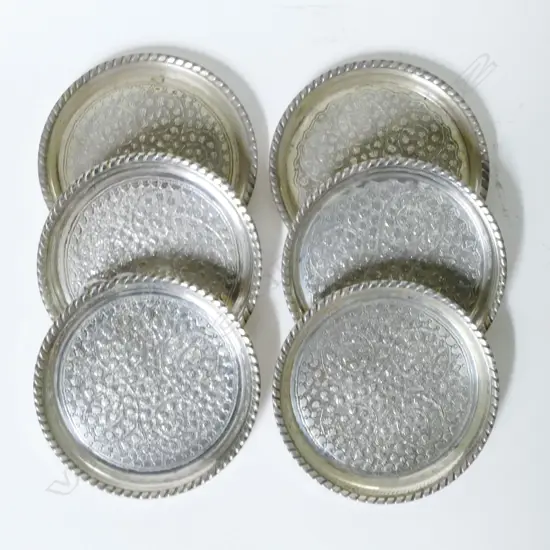 A set of six Pakistani silver coasters