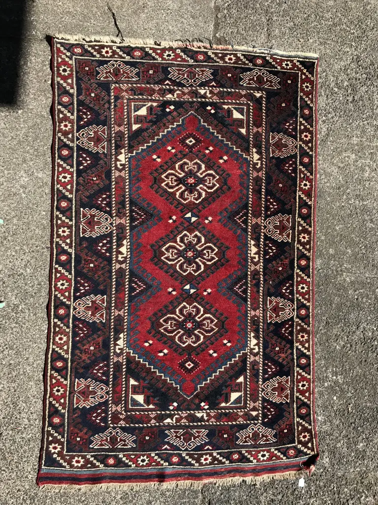 An Afghan handknotted rug Image 1++