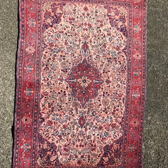 An Iranian Sarouk hand knotted carpet
