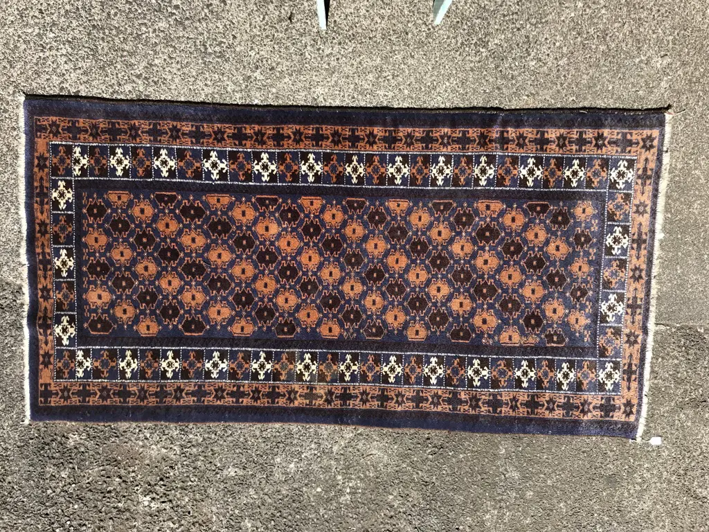 A hand knotted Baluchi rug Image 1++