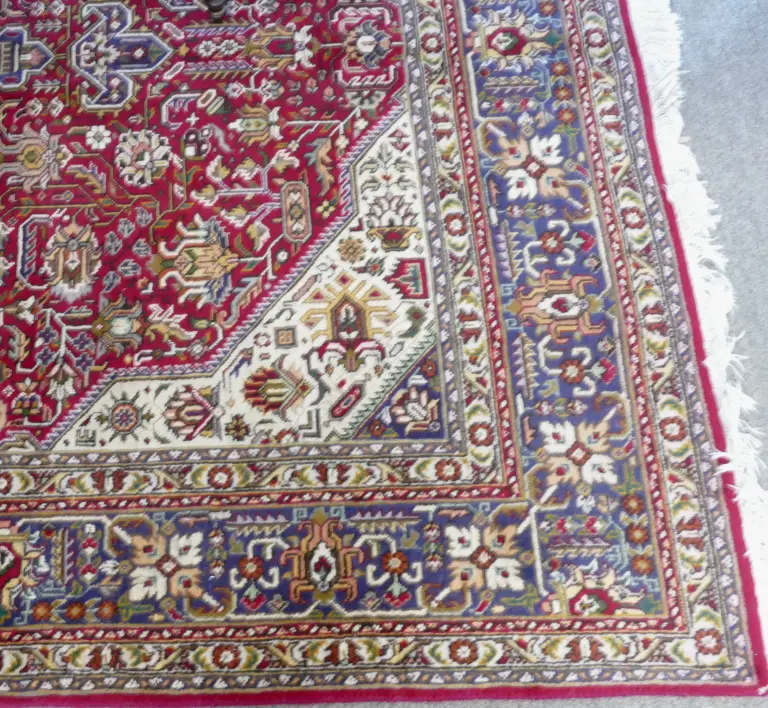 A hand knotted Persian Tabriz carpet Image 1++