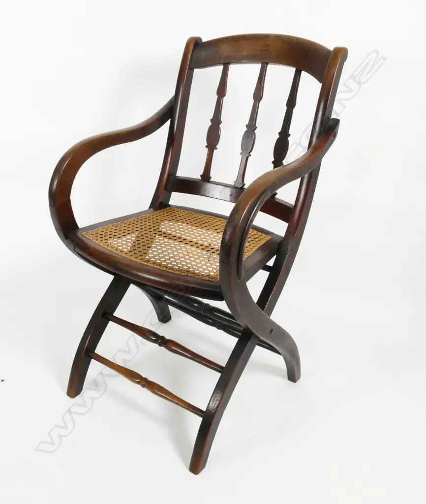 A 19thC Nicholas Gollingnon walnut campaign chair Image 1++