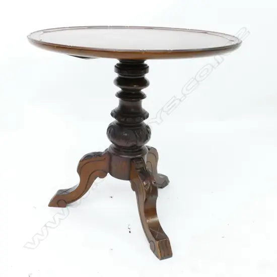 A Victorian oak wine table