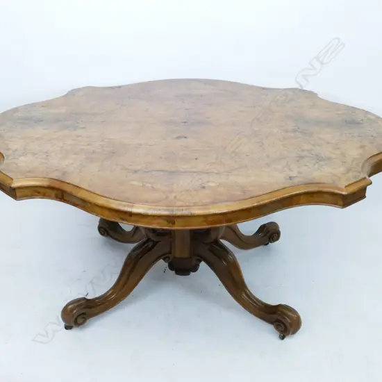 A Victorian burr walnut loo table
