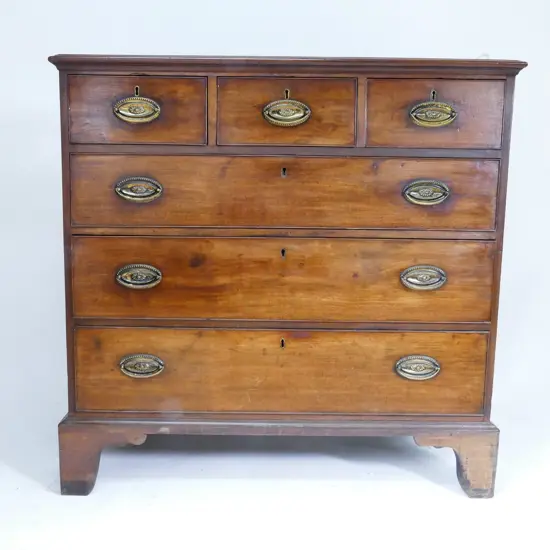 A Georgian flat-front mahogany chest of six drawers
