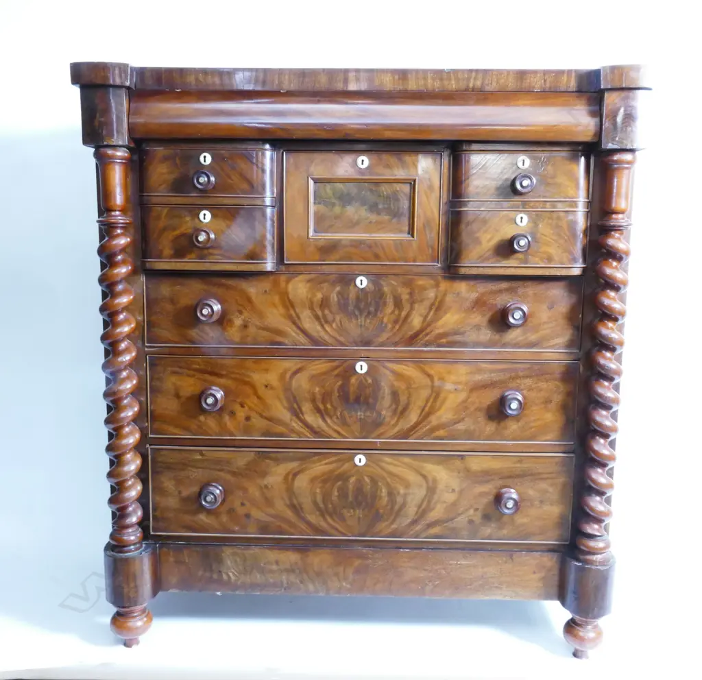 An impressive Victorian flame mahogany scotch chest Image 1++