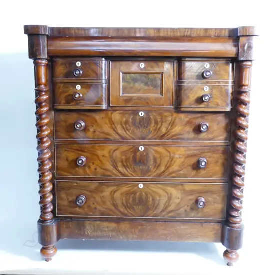 An impressive Victorian flame mahogany scotch chest