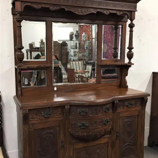 A colonial kauri mirrorback sideboard