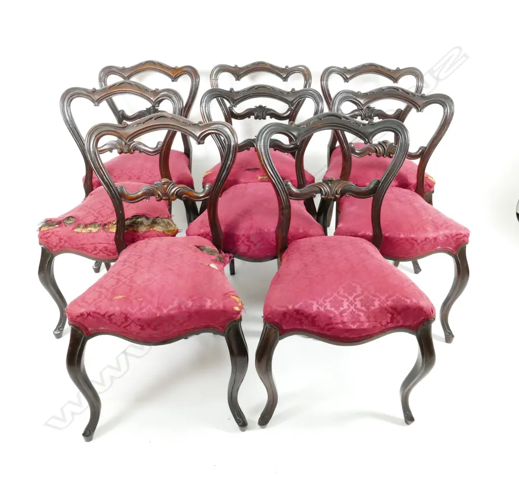 A set of eight Victorian rosewood balloon back dining chairs Image 1++