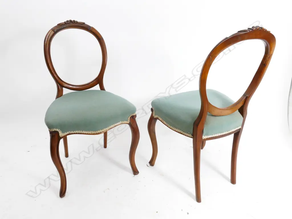 A set of six Victorian walnut balloon back dining chairs Image 1++