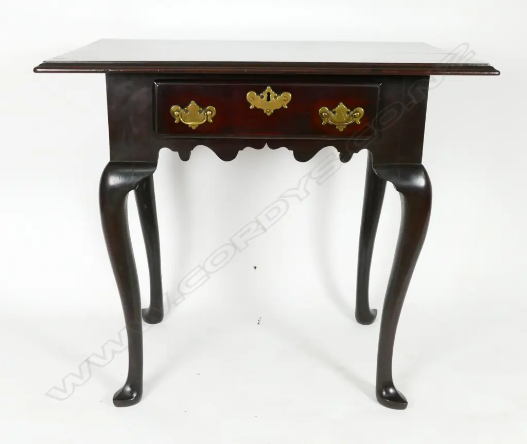 A George III solid mahogany side table Image 1++