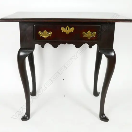 A George III solid mahogany side table