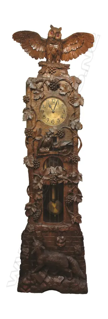 A spectacular walnut carved Black Forest long case clock Image 1++