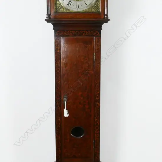 A George III ornate marquetry inlaid oak longcase clock