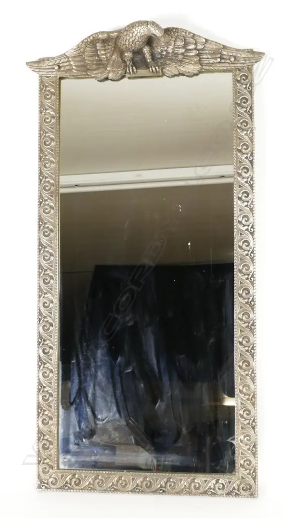 A highly decorative metal framed mirror Image 1++