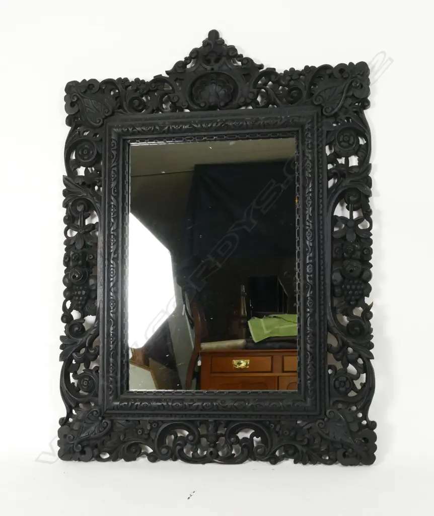 A Victorian ebonised wood mirror Image 1++