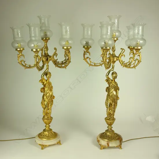 A pair of vintage antique style large figured ormolu table candelabra