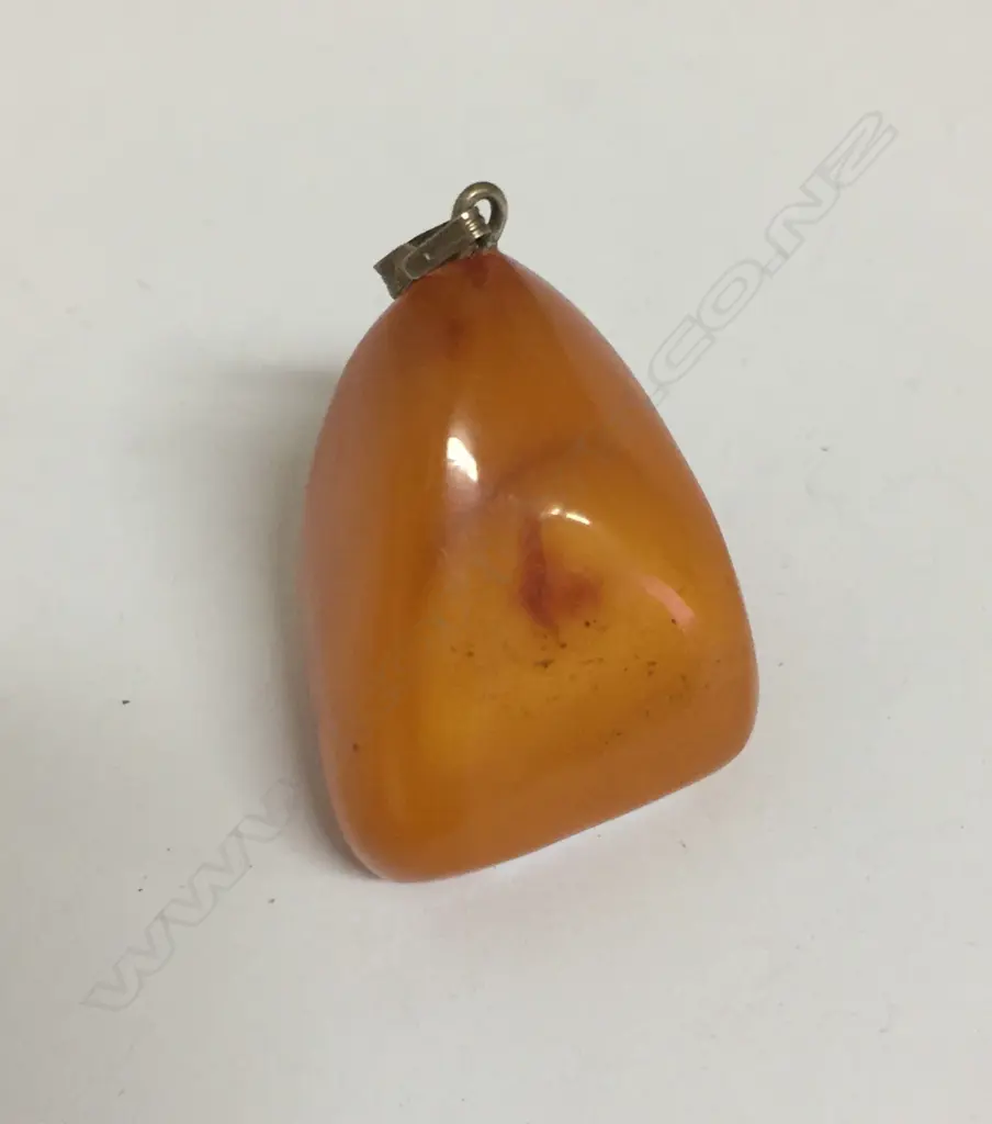 An amber large polished nugget pendant drop Image 1++