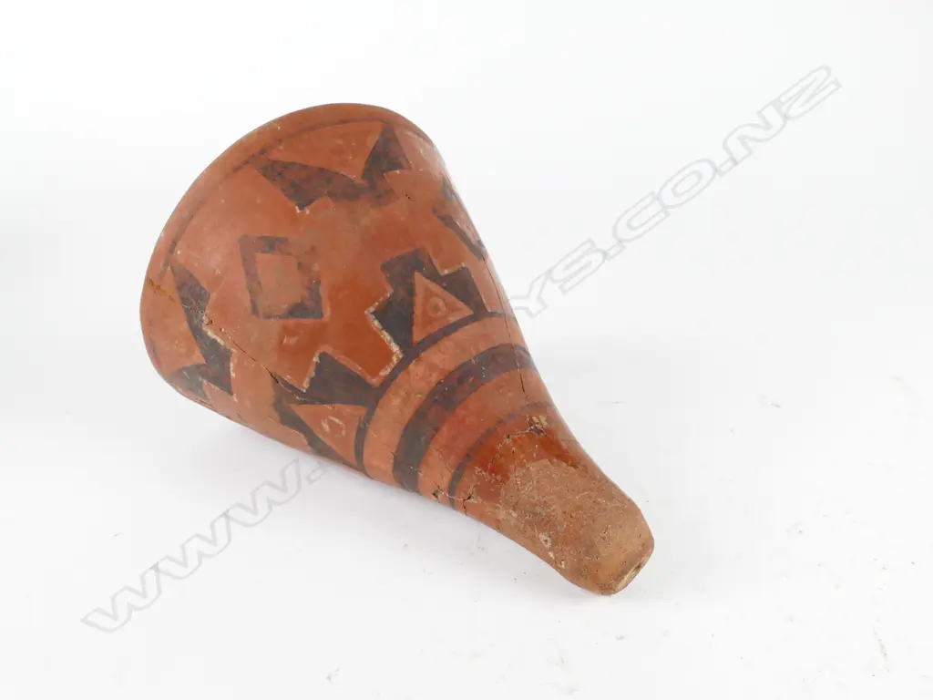 A pre-Columbian clay funnel Image 1++