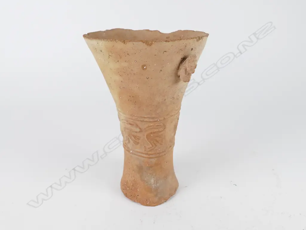 A pre-Columbian Peruvian clay vessel Image 1++